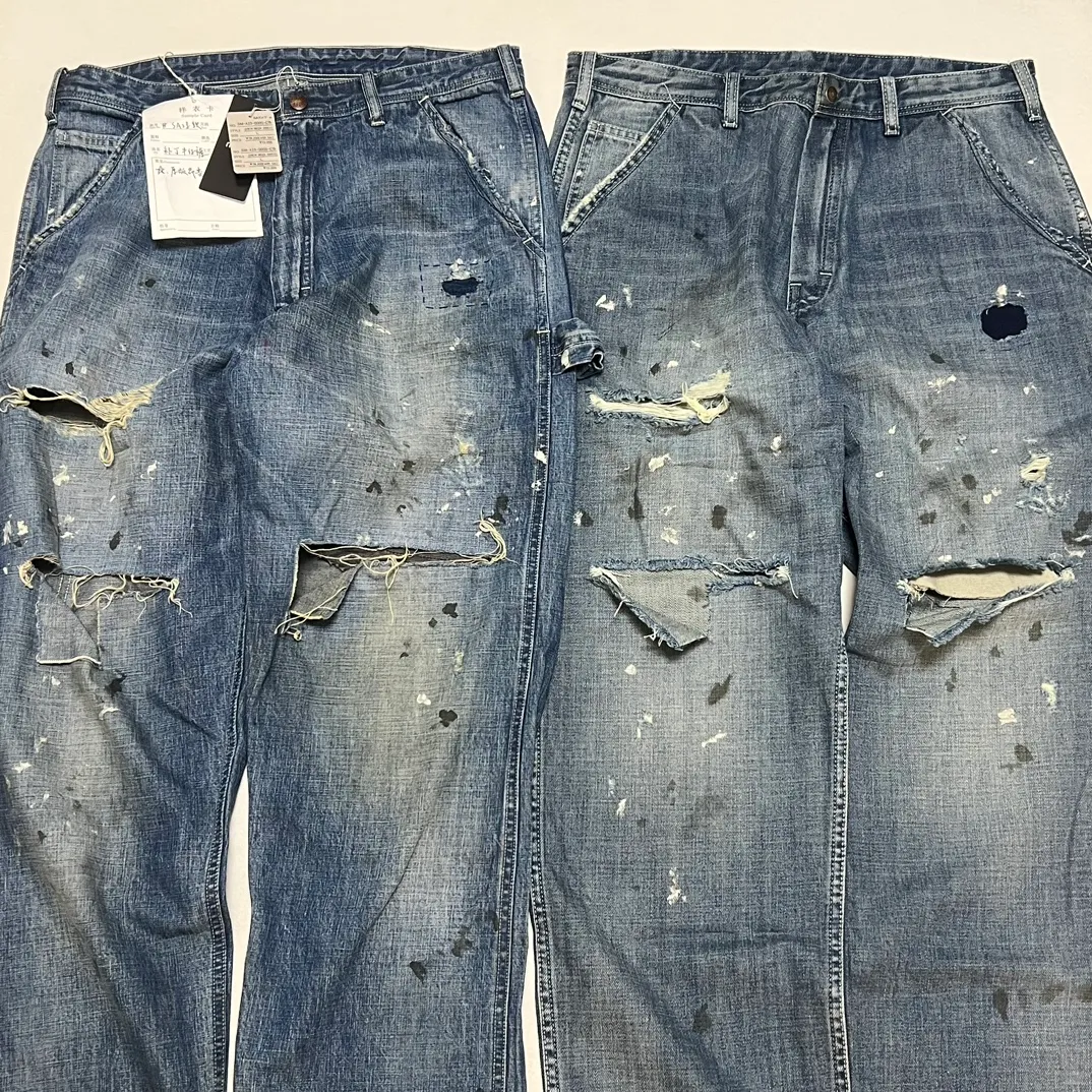 Proofing VS ZP SAINT Mxxxxxx SAINT_DENIM PANTS/PAINTER /BLUE Knife cut holes and splashed ink logging trousers Patch jeans Blue S-XL All accessories are molded and customized Super heavy work Washed and worn Knife cut holes Artificial ink splashed graffiti Genuine version Loose and stylish